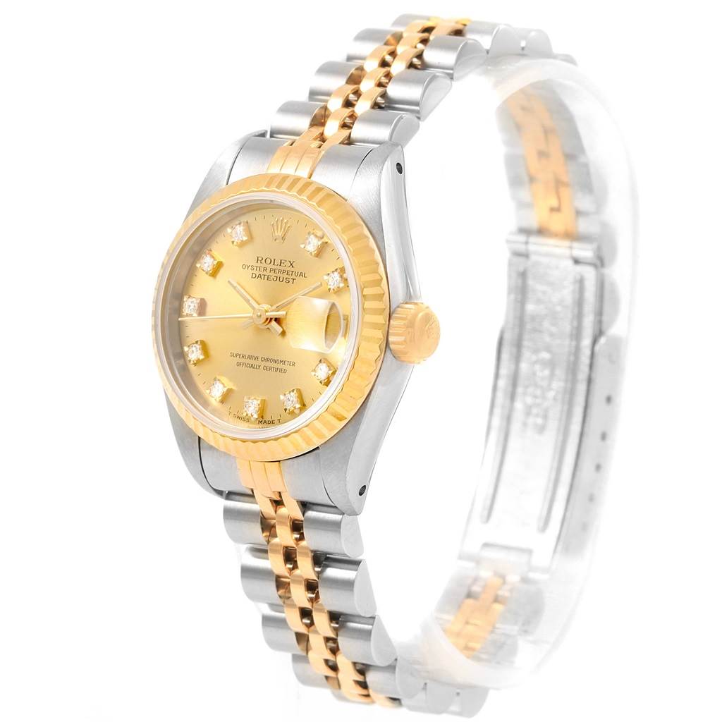 The Rolex Datejust 69173 Women's Stainless Steel Champagne Dial 69173 Women's Stainless Steel Champagne Dial watch is shown at a slight angle, highlighting the gold and silver Jubilee bracelet, gold bezel, and dial.