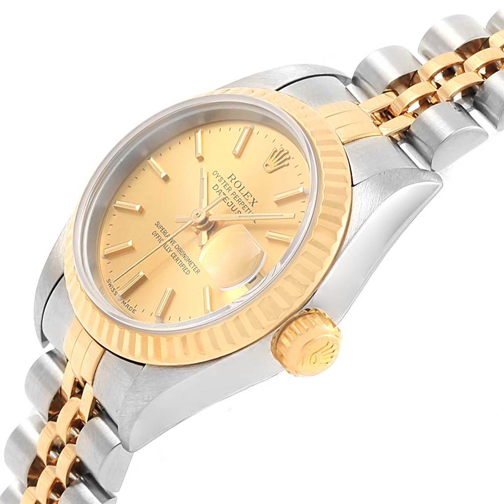 This image shows a Rolex Datejust 79173 Women's Steel and Gold (two tone) Champagne Dial 79173 Women's Steel and Gold (two tone) Champagne Dial watch from a side angle, highlighting the gold-toned dial, crown, and two-tone bracelet.