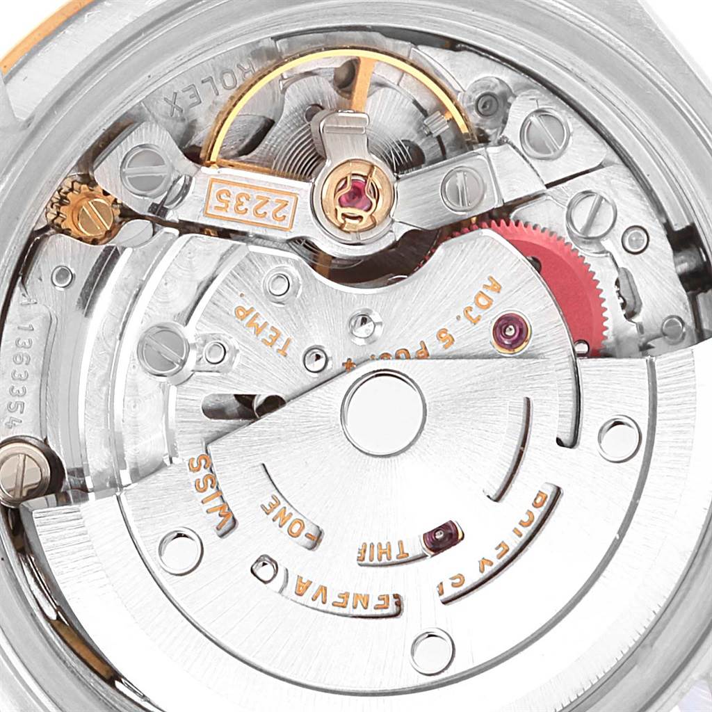 The image shows a close-up view of the movement and internal components of a Rolex Datejust 79173 Women's Steel and Gold (two tone) Champagne Dial 79173 Women's Steel and Gold (two tone) Champagne Dial watch.