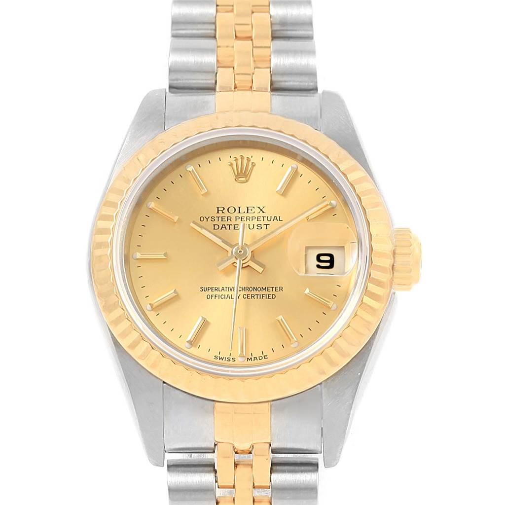 The image shows a front-view angle of a Rolex Datejust 79173 Women's Steel and Gold (two tone) Champagne Dial 79173 Women's Steel and Gold (two tone) Champagne Dial watch featuring a gold dial, fluted bezel, and two-tone bracelet.