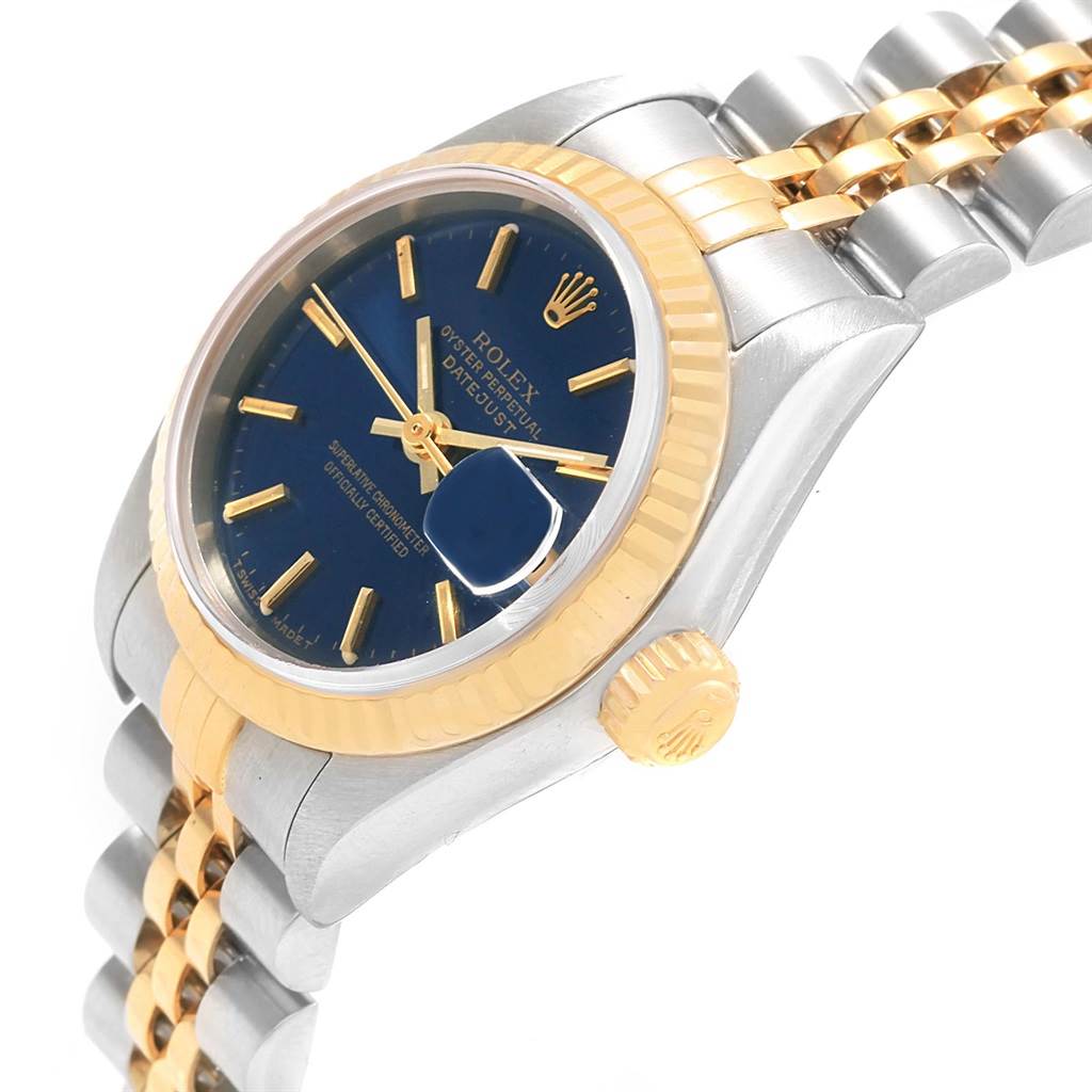 The image shows a side angle of the Rolex Datejust 79173 Women's Steel and Gold (two tone) Blue Dial 79173 Women's Steel and Gold (two tone) Blue Dial watch, highlighting its bezel, crown, and part of its two-tone bracelet.