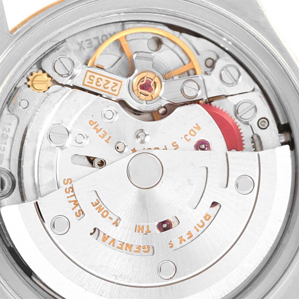 The image shows the back view of a Rolex Datejust 79173 Women's Steel and Gold (two tone) Blue Dial 79173 Women's Steel and Gold (two tone) Blue Dial's mechanical movement and intricate components.