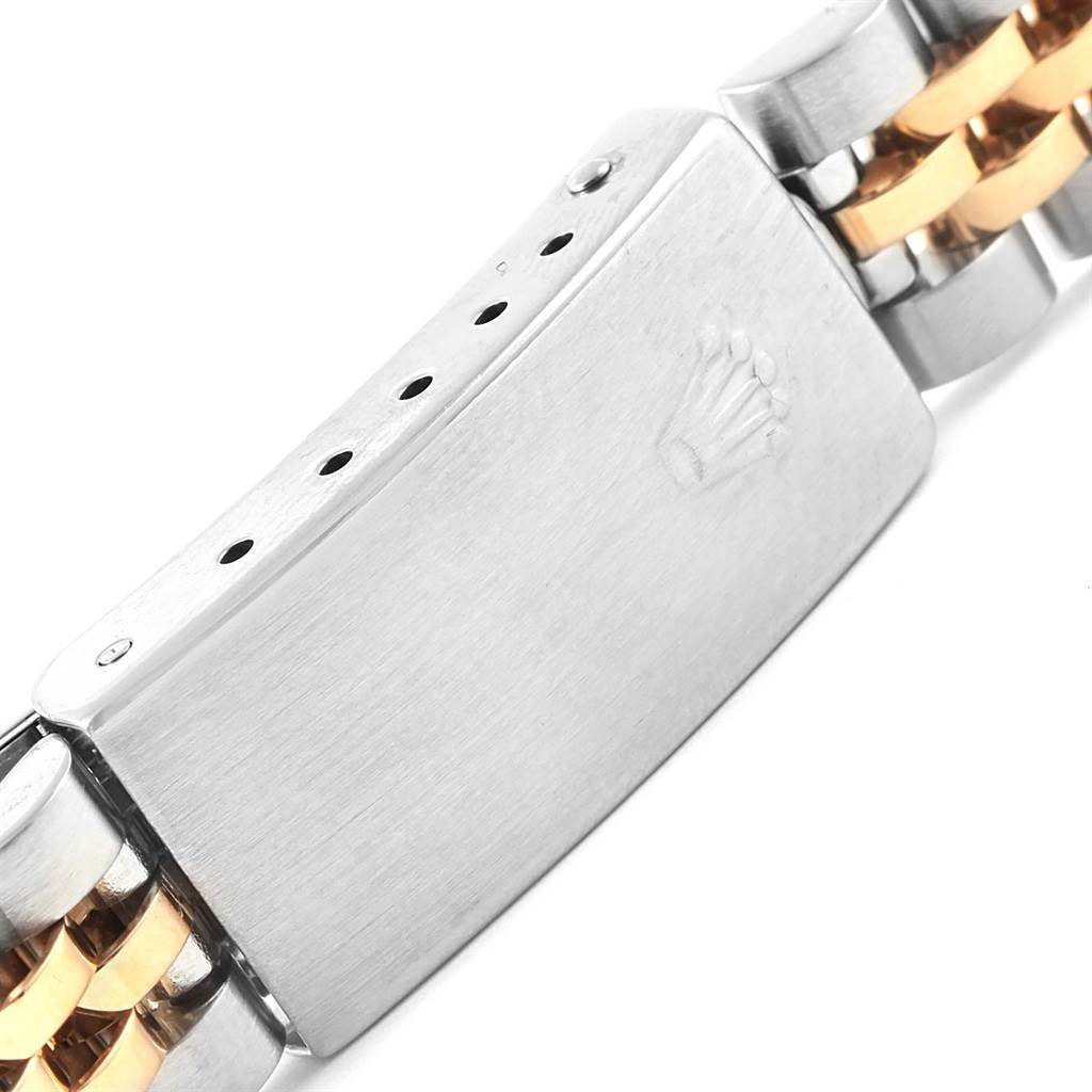 This image shows the clasp of a Rolex Datejust 79173 Women's Steel and Gold (two tone) Blue Dial 79173 Women's Steel and Gold (two tone) Blue Dial bracelet at a close-up angle.