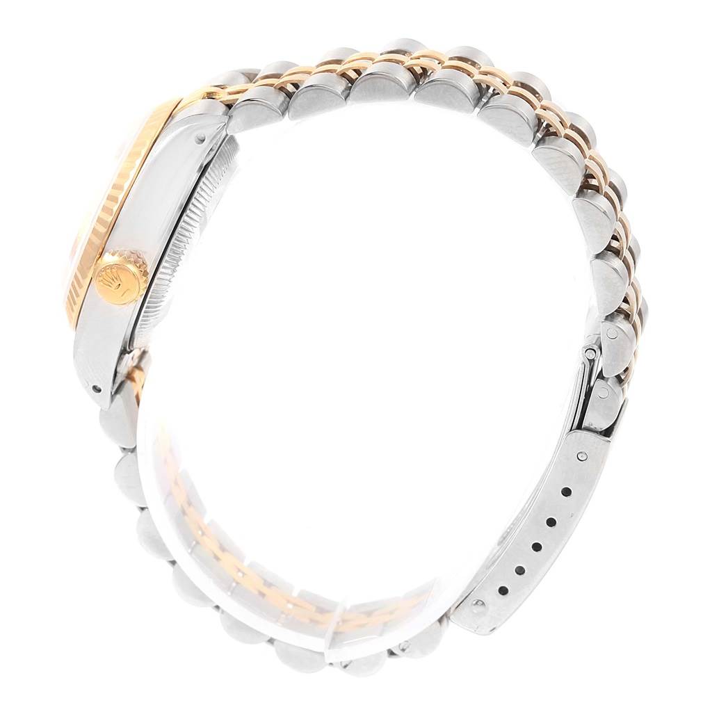 This image shows a side angle of a Rolex Datejust 69173 Women's Stainless Steel Champagne Dial 69173 Women's Stainless Steel Champagne Dial watch, focusing on the crown, case, and two-tone bracelet.