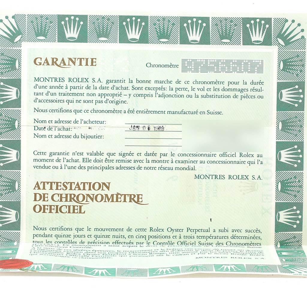 This image shows the warranty certificate for a Rolex Datejust 69173 Women's Stainless Steel Champagne Dial 69173 Women's Stainless Steel Champagne Dial watch, featuring the brand's official signatures and guarantees.