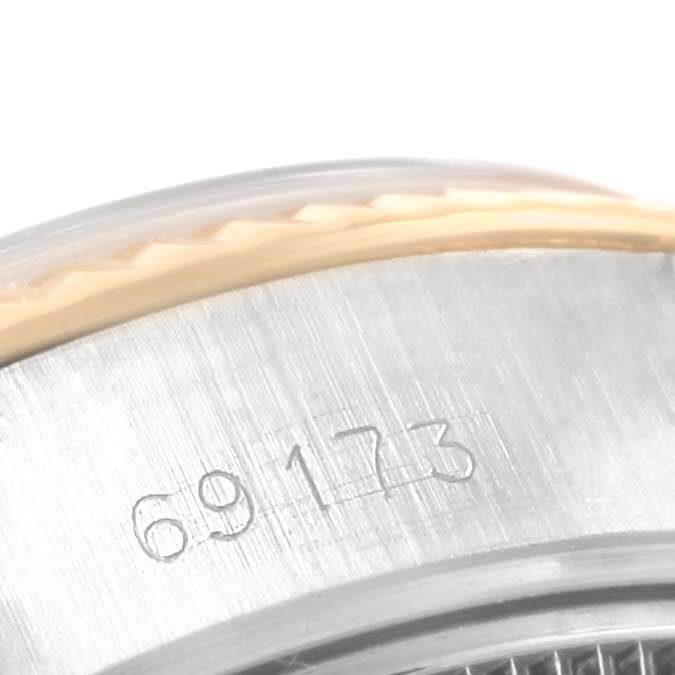 The image shows a close-up of the model number engraved on the side of the Rolex Datejust 69173 Women's Stainless Steel White Dial 69173 Women's Stainless Steel White Dial watch.