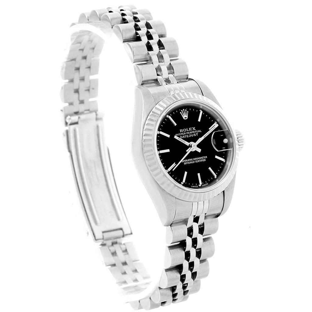 The image shows a Rolex Datejust 69174 Women's Stainless Steel Black Dial 69174 Women's Stainless Steel Black Dial watch from a three-quarter angle, highlighting its face and Jubilee bracelet.