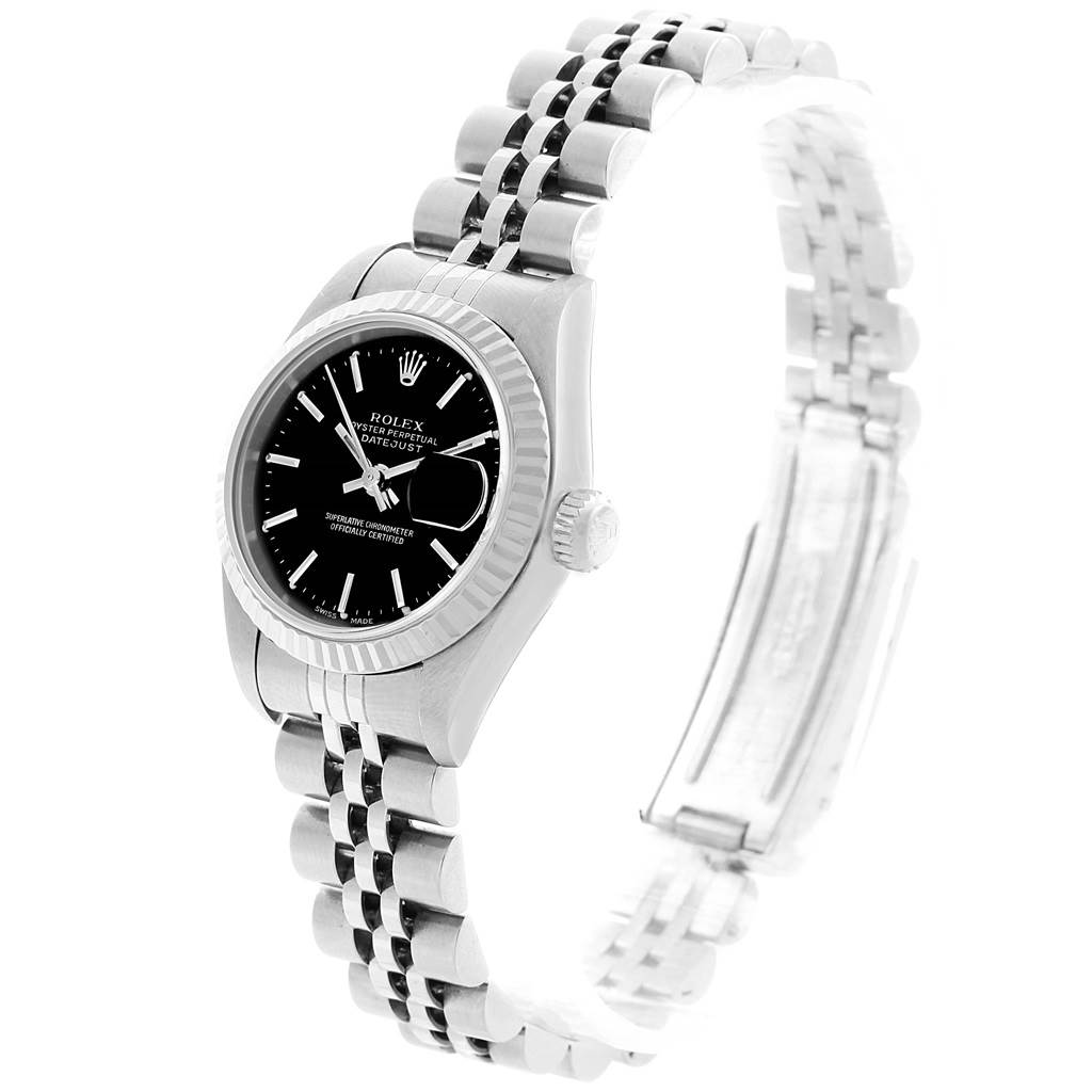 The image shows a side angle of the Rolex Datejust 69174 Women's Stainless Steel Black Dial 69174 Women's Stainless Steel Black Dial watch featuring its black dial, fluted bezel, and Jubilee bracelet.