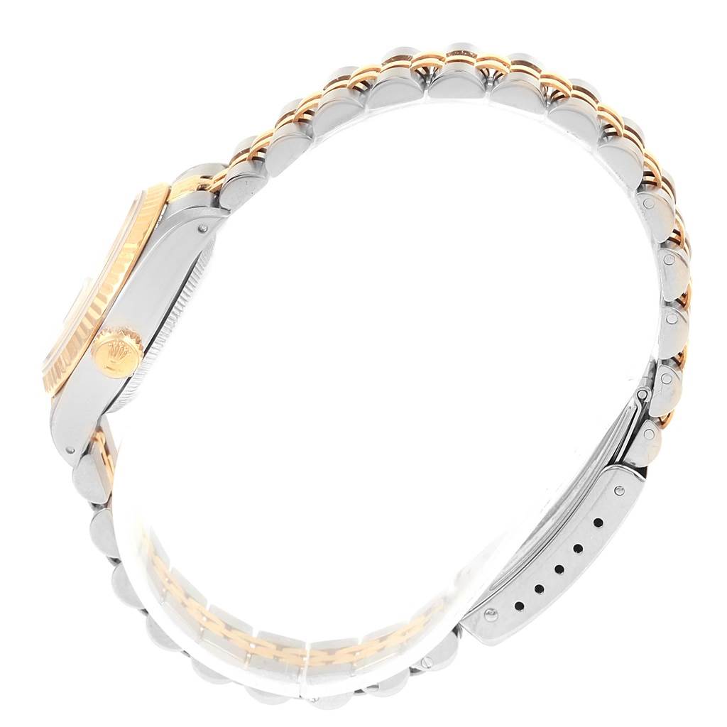 The image shows a side view of the Rolex Datejust 69173 Women's Stainless Steel Champagne Dial 69173 Women's Stainless Steel Champagne Dial watch, highlighting the two-tone bracelet and crown.