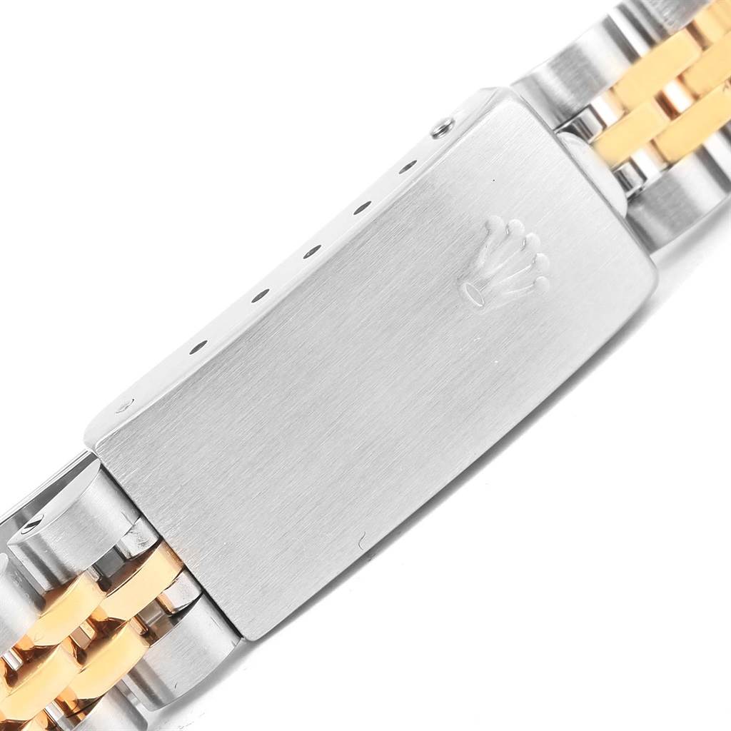 This image shows a close-up of the clasp and part of the bracelet of a Rolex Datejust 69173 Women's Stainless Steel Champagne Dial 69173 Women's Stainless Steel Champagne Dial watch.