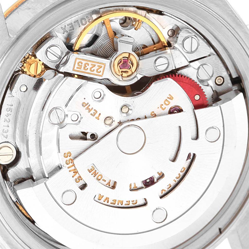 The close-up image shows the intricate movement mechanism of a Rolex Datejust 79173 Women's Steel and Gold (two tone) Champagne Dial 79173 Women's Steel and Gold (two tone) Champagne Dial watch.