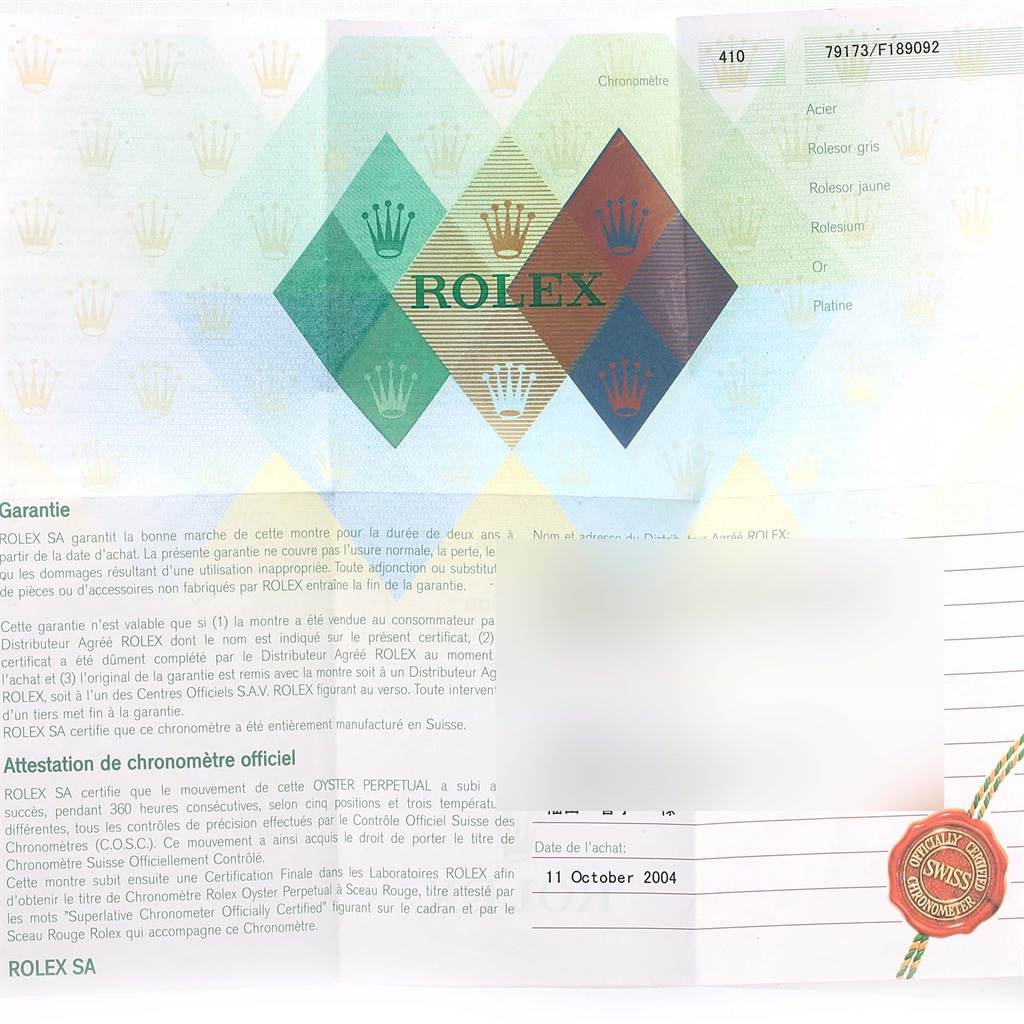 The image shows a warranty card and certification with details for a Rolex Datejust 79173 Women's Steel and Gold (two tone) Champagne Dial 79173 Women's Steel and Gold (two tone) Champagne Dial watch.