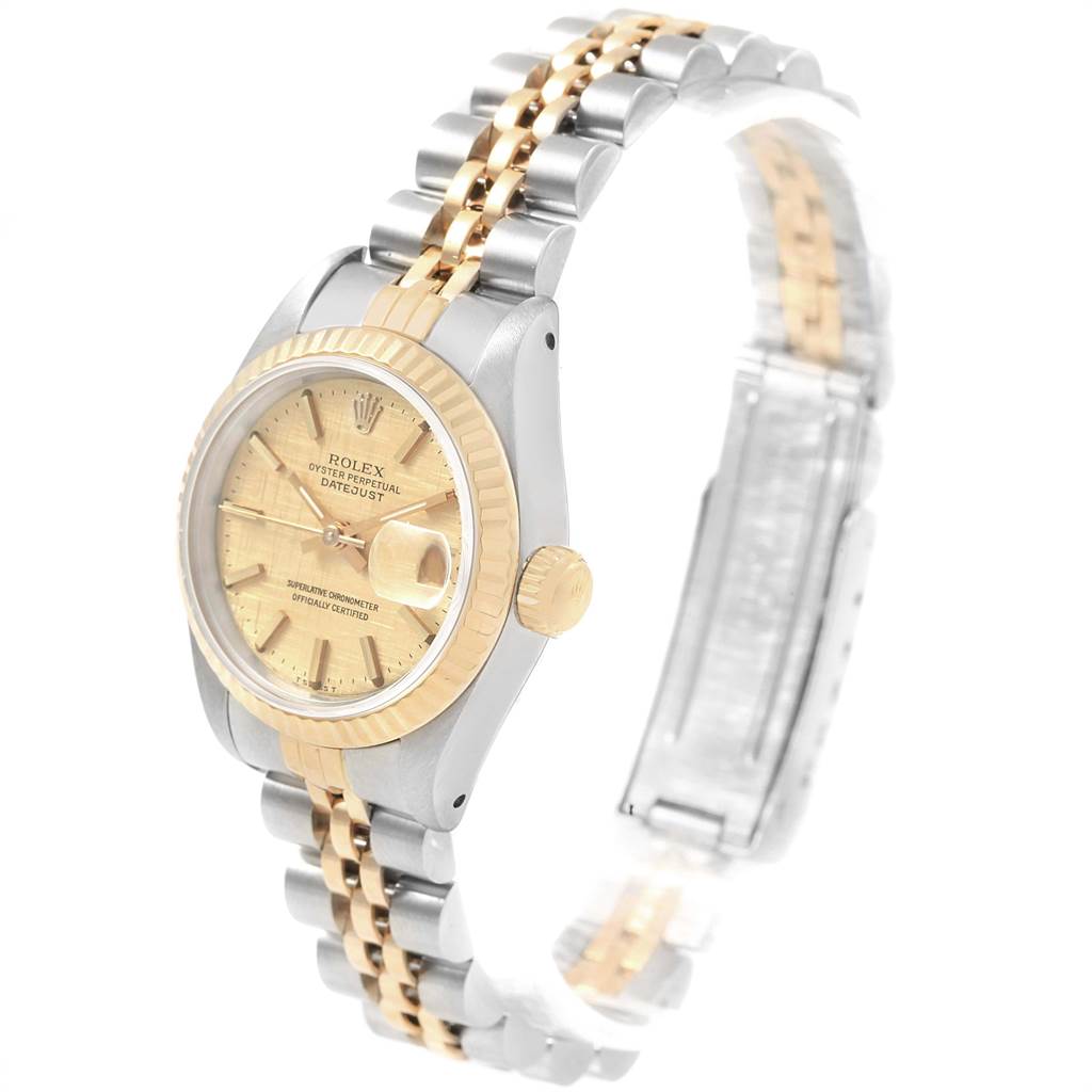 The Rolex Datejust 69173 Women's Stainless Steel Champagne Dial 69173 Women's Stainless Steel Champagne Dial watch is shown at a slight angle, displaying the face, bezel, and part of the bracelet.