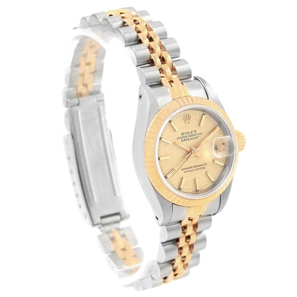 The image shows a Rolex Datejust 69173 Women's Stainless Steel Champagne Dial 69173 Women's Stainless Steel Champagne Dial watch at a three-quarter angle, highlighting its two-tone bracelet and champagne dial.