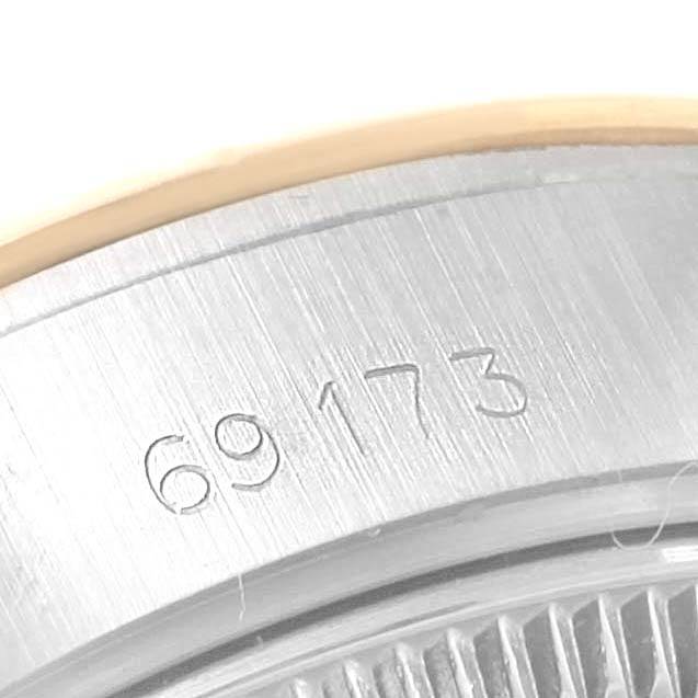 This image shows a close-up of the case with the reference number "69173" engraved on a Rolex Datejust 69173 Women's Stainless Steel Champagne Dial 69173 Women's Stainless Steel Champagne Dial watch.