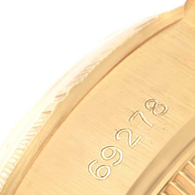 This image shows a close-up of the case side and engraved model number of a Rolex Datejust 69278 Women's Yellow Gold Mother of Pearl Dial 69278 Women's Yellow Gold Mother of Pearl Dial watch.