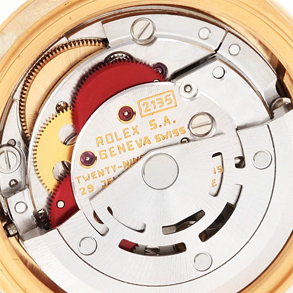 The image shows a close-up of the internal movement mechanism of a Rolex Datejust 69278 Women's Yellow Gold Mother of Pearl Dial 69278 Women's Yellow Gold Mother of Pearl Dial watch.