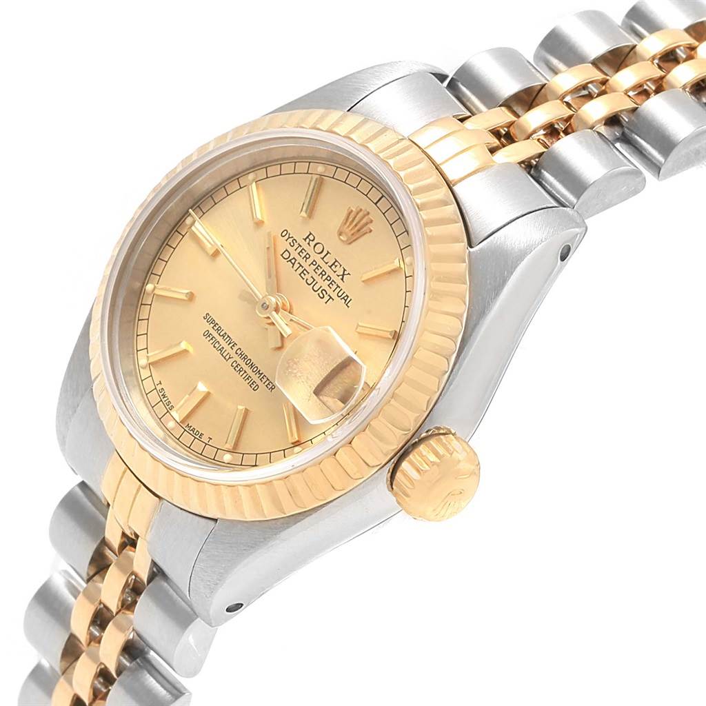This image shows a side angle of a Rolex Datejust 69173 Women's Stainless Steel Champagne Dial 69173 Women's Stainless Steel Champagne Dial watch, highlighting its dial, crown, bezel, and part of the bracelet.
