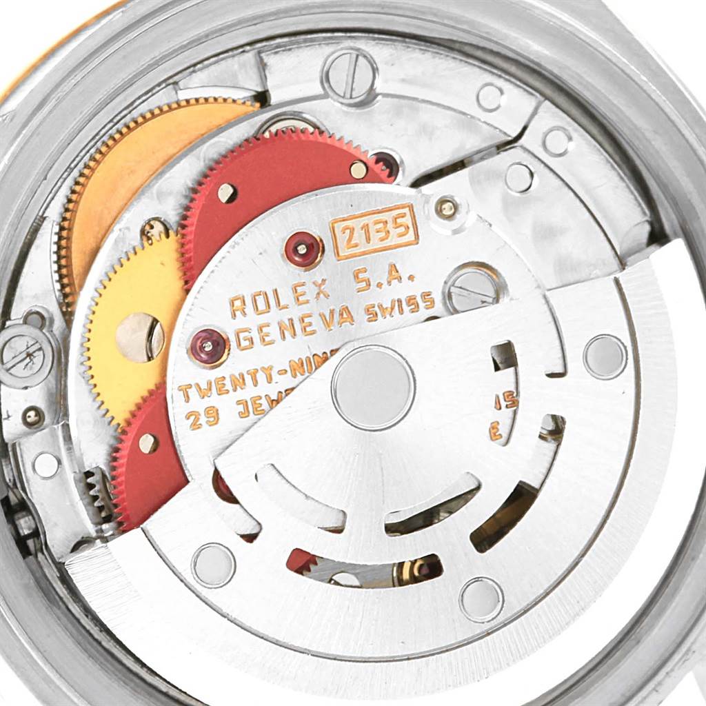 This image shows the internal mechanisms and gears of a Rolex Datejust 69173 Women's Stainless Steel Champagne Dial 69173 Women's Stainless Steel Champagne Dial watch, highlighting its intricate movement.