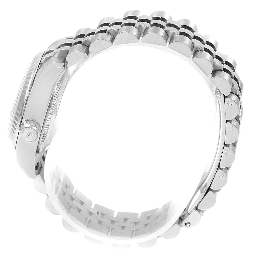 The image shows the side view of a Rolex Datejust 179174 Women's Stainless Steel Mother of Pearl Dial 179174 Women's Stainless Steel Mother of Pearl Dial watch, focusing on the bracelet and part of the crown.