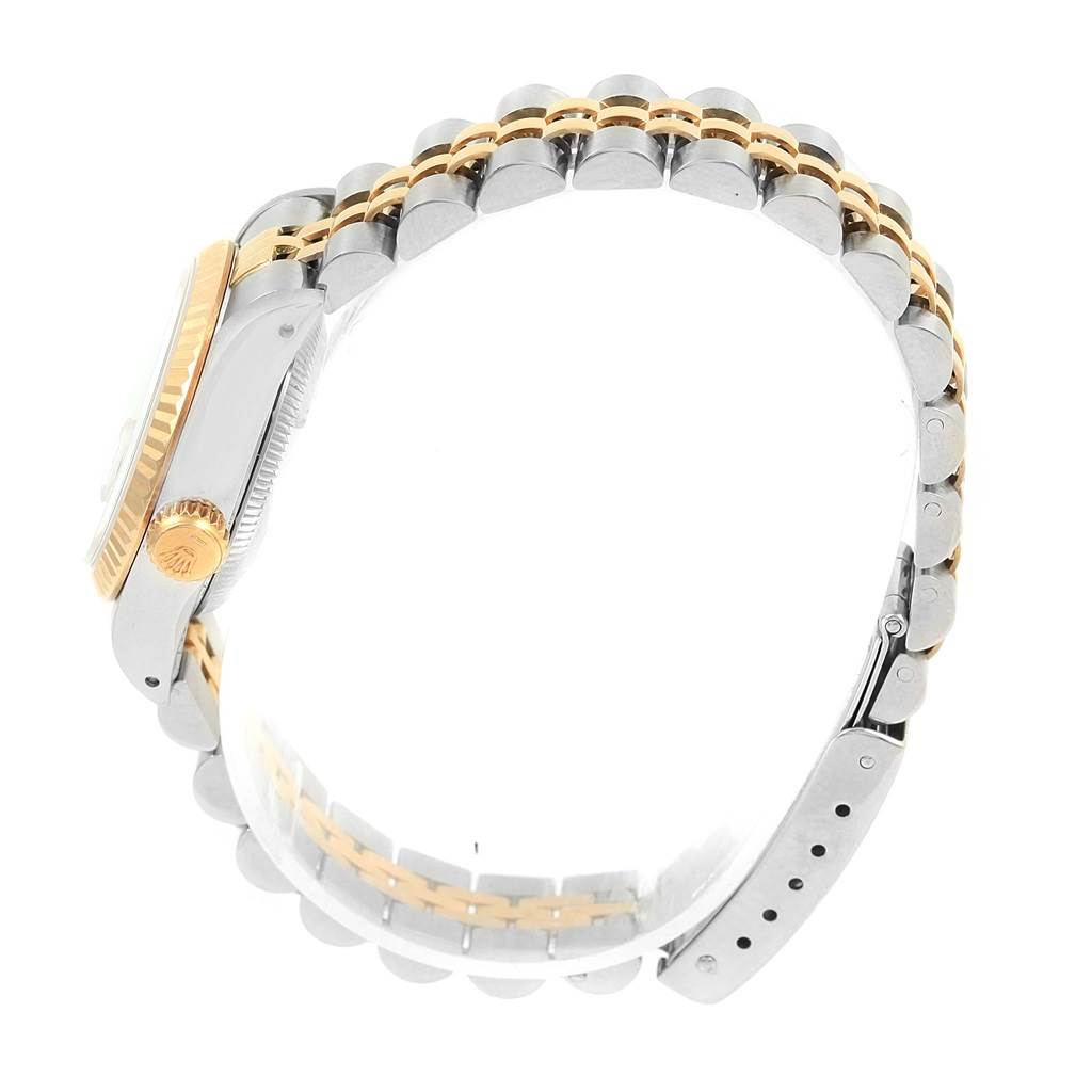 The image shows a side view of the Rolex Datejust 69173 Women's Stainless Steel White Dial 69173 Women's Stainless Steel White Dial watch, highlighting its two-tone bracelet and case side.