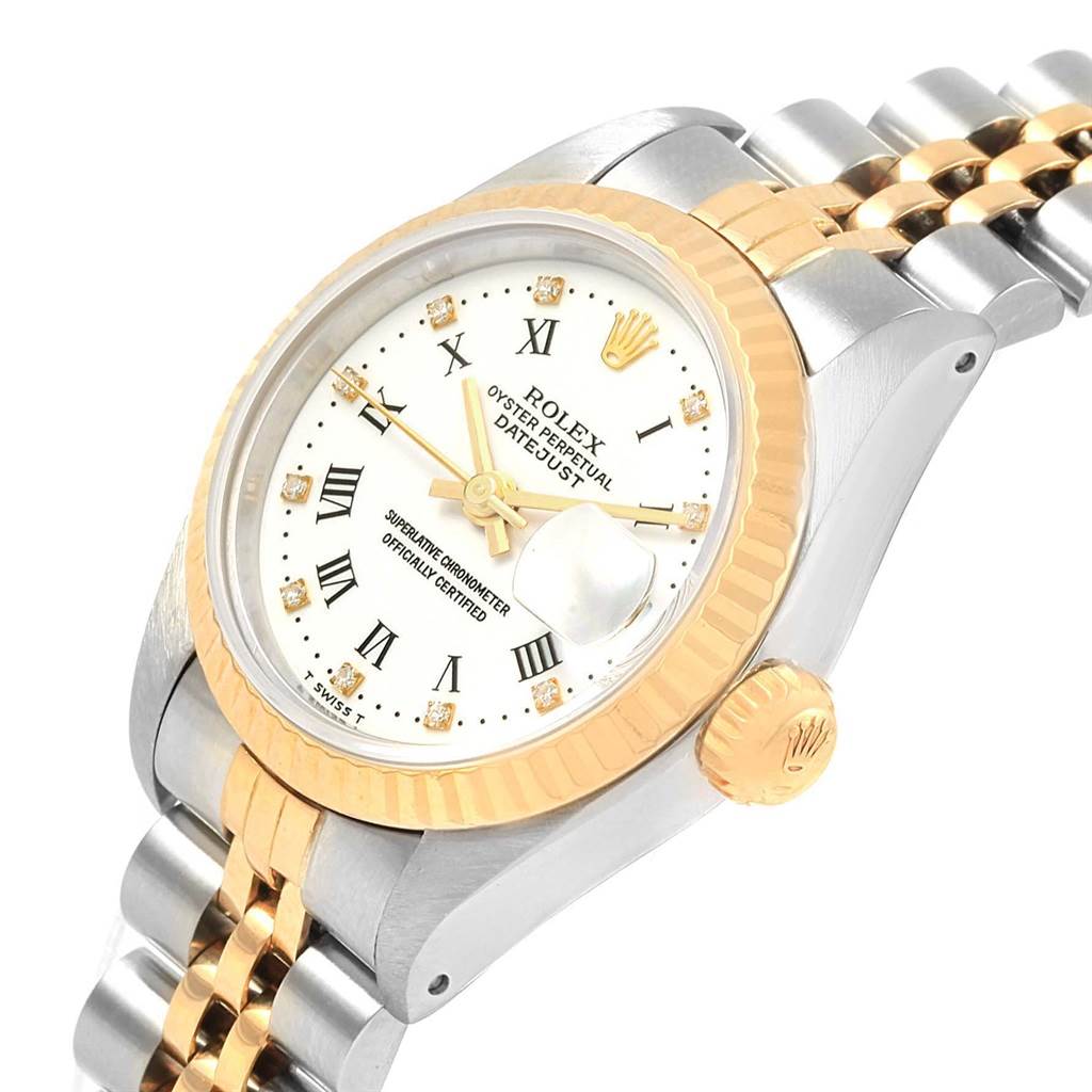 The Rolex Datejust 69173 Women's Stainless Steel White Dial 69173 Women's Stainless Steel White Dial watch is shown from an angle emphasizing the face, bezel, crown, and part of the two-tone bracelet.