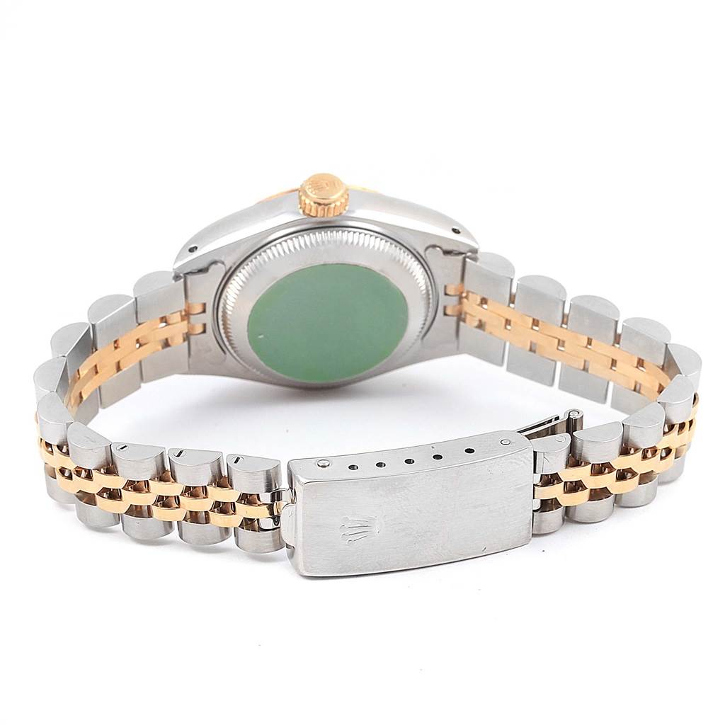 The image shows the back view of a Rolex Datejust 69173 Women's Stainless Steel Champagne Dial 69173 Women's Stainless Steel Champagne Dial watch, featuring its two-tone bracelet and closed clasp.