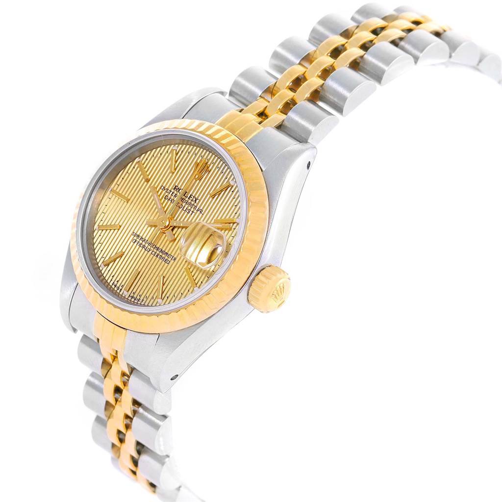 The image shows a Rolex Datejust 69173 Women's Stainless Steel Champagne Dial 69173 Women's Stainless Steel Champagne Dial watch at an angle highlighting the two-tone metal bracelet, gold fluted bezel, and gold dial.