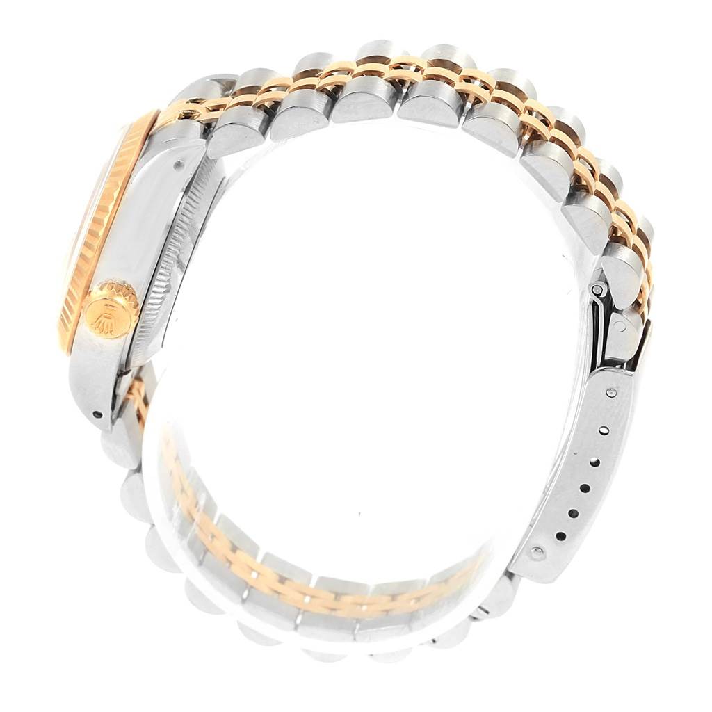 The image shows a side view of the Rolex Datejust 69173 Women's Stainless Steel Champagne Dial 69173 Women's Stainless Steel Champagne Dial watch, displaying its crown and two-tone bracelet.