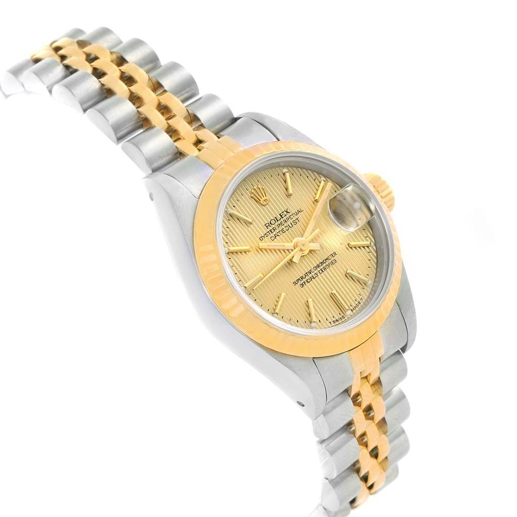 This image shows a Rolex Datejust 69173 Women's Stainless Steel Champagne Dial 69173 Women's Stainless Steel Champagne Dial model watch at a slight angle, highlighting the face, bezel, and two-tone bracelet.