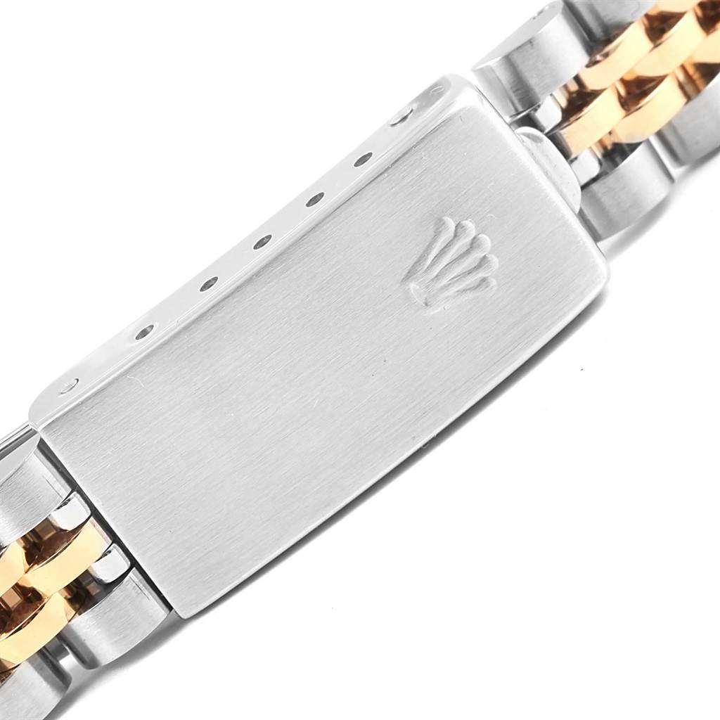 This image shows a close-up of the clasp and part of the bracelet of a Rolex Datejust 69173 Women's Stainless Steel Blue Dial 69173 Women's Stainless Steel Blue Dial watch.