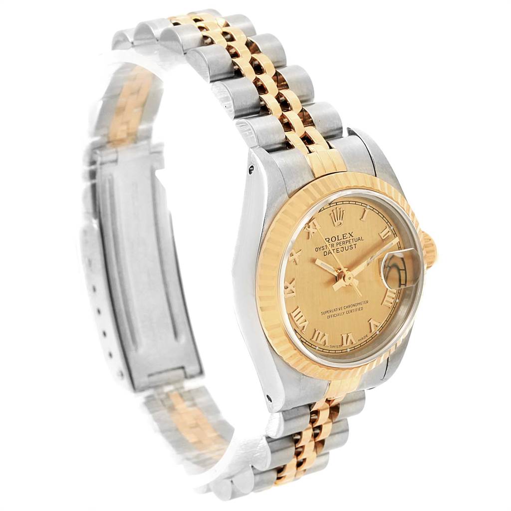 The image shows a side view of the Rolex Datejust 69173 Women's Stainless Steel Champagne Dial 69173 Women's Stainless Steel Champagne Dial watch, highlighting its gold and silver bracelet, bezel, dial, and cyclops lens.
