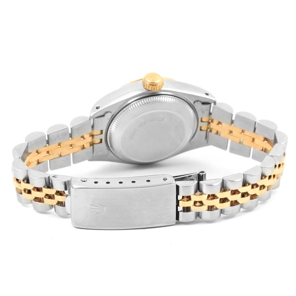 This image shows the back of a Rolex Datejust 69173 Women's Stainless Steel Champagne Dial 69173 Women's Stainless Steel Champagne Dial watch including its silver and gold jubilee bracelet with the clasp.