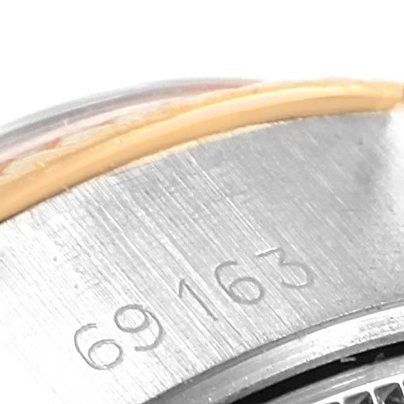 The image shows a close-up of the case back of a Rolex Datejust 69173 Women's Stainless Steel Champagne Dial 69173 Women's Stainless Steel Champagne Dial watch, revealing its reference number 69163.