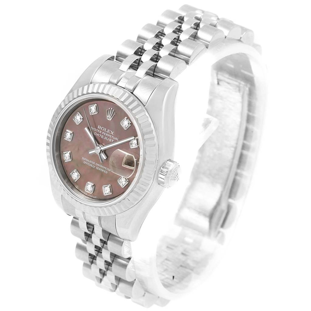 This image shows a Rolex Datejust 179174 Women's Stainless Steel Mother of Pearl Dial 179174 Women's Stainless Steel Mother of Pearl Dial watch with a partial view of the face and band at an angled perspective.
