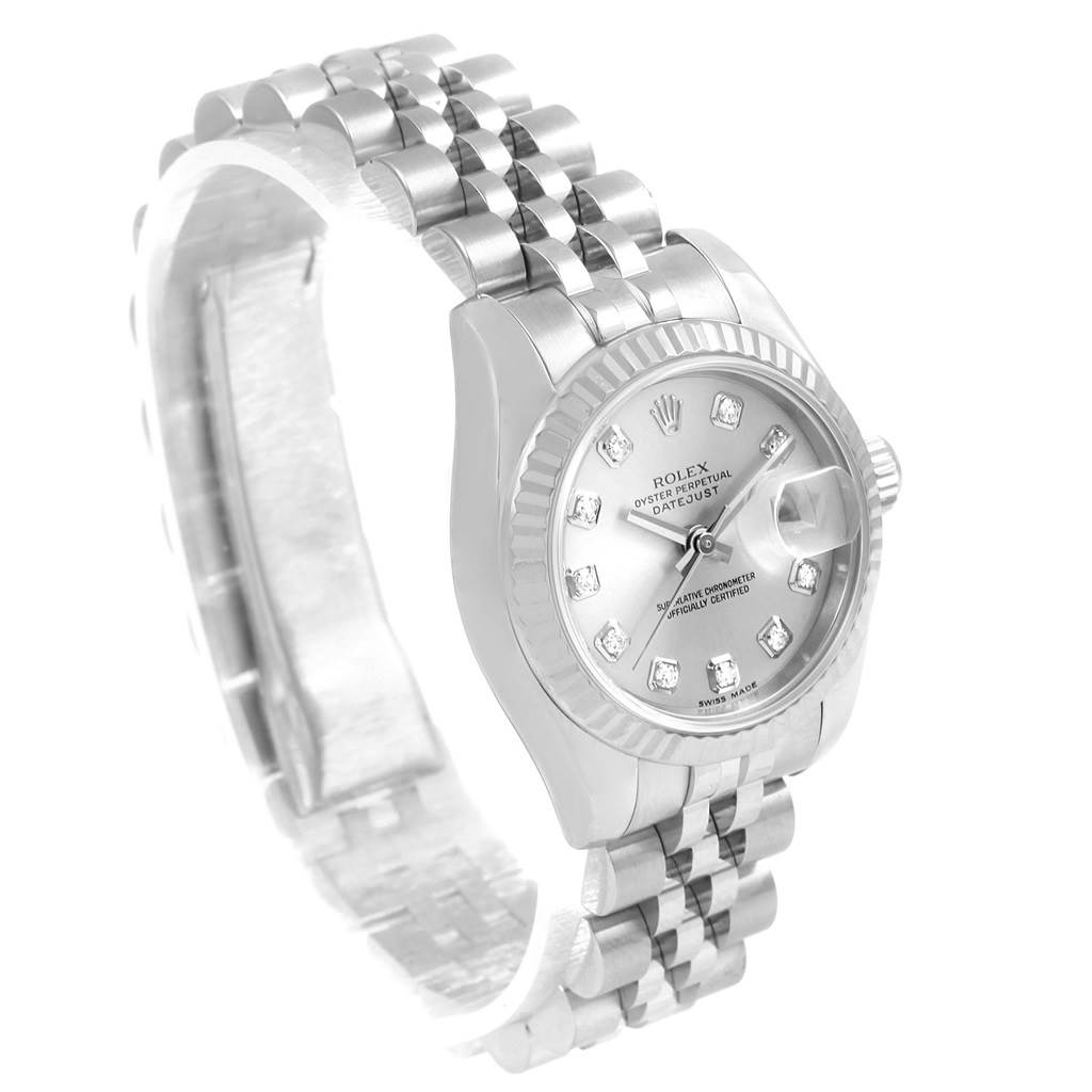 The image shows a Rolex Datejust 179174 Women's Stainless Steel Silver Dial 179174 Women's Stainless Steel Silver Dial watch from a slight side angle, highlighting its bezel, dial, and metal bracelet.