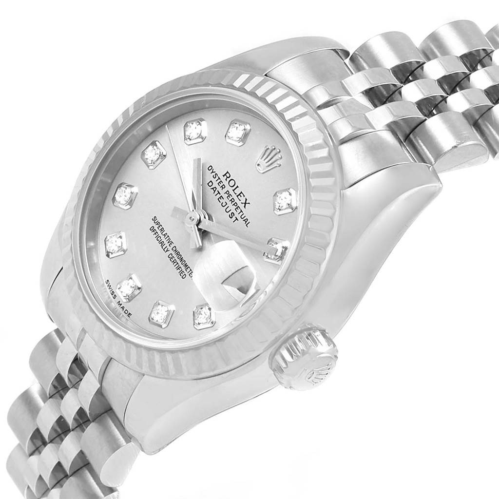 The Rolex Datejust 179174 Women's Stainless Steel Silver Dial 179174 Women's Stainless Steel Silver Dial watch is shown from an angled view, displaying its dial, fluted bezel, crown, and partial Jubilee bracelet.
