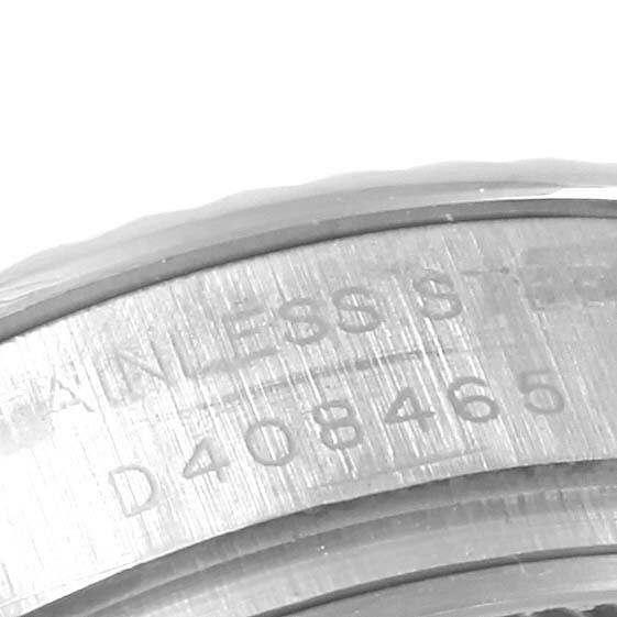 The image shows a close-up of the bezel and serial number on a Rolex Datejust 179174 Women's Stainless Steel Silver Dial 179174 Women's Stainless Steel Silver Dial watch.