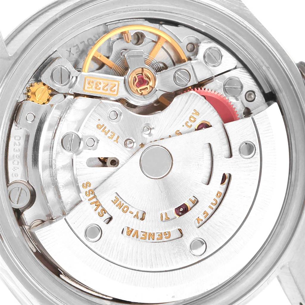 This image shows the internal movement mechanism of a Rolex Datejust 79174 Women
s Stainless Steel Pink Dial 79174 Women
s Stainless Steel Pink Dial watch from a close-up angle.