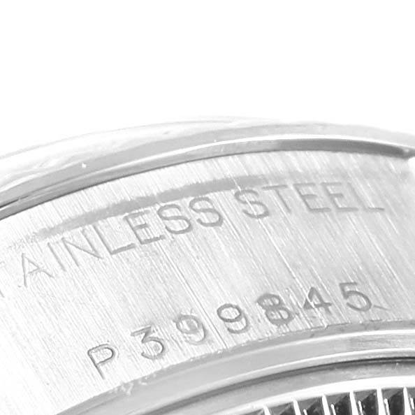 The image shows a close-up view of the stainless steel casing with identifying engravings of a Rolex Datejust 79174 Women
s Stainless Steel Pink Dial 79174 Women
s Stainless Steel Pink Dial.