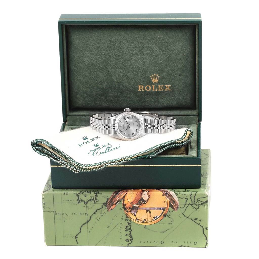 The image shows a Rolex Datejust 69174 Women's Stainless Steel Silver Dial 69174 Women's Stainless Steel Silver Dial watch displayed in its open green box with a cloth underneath it.