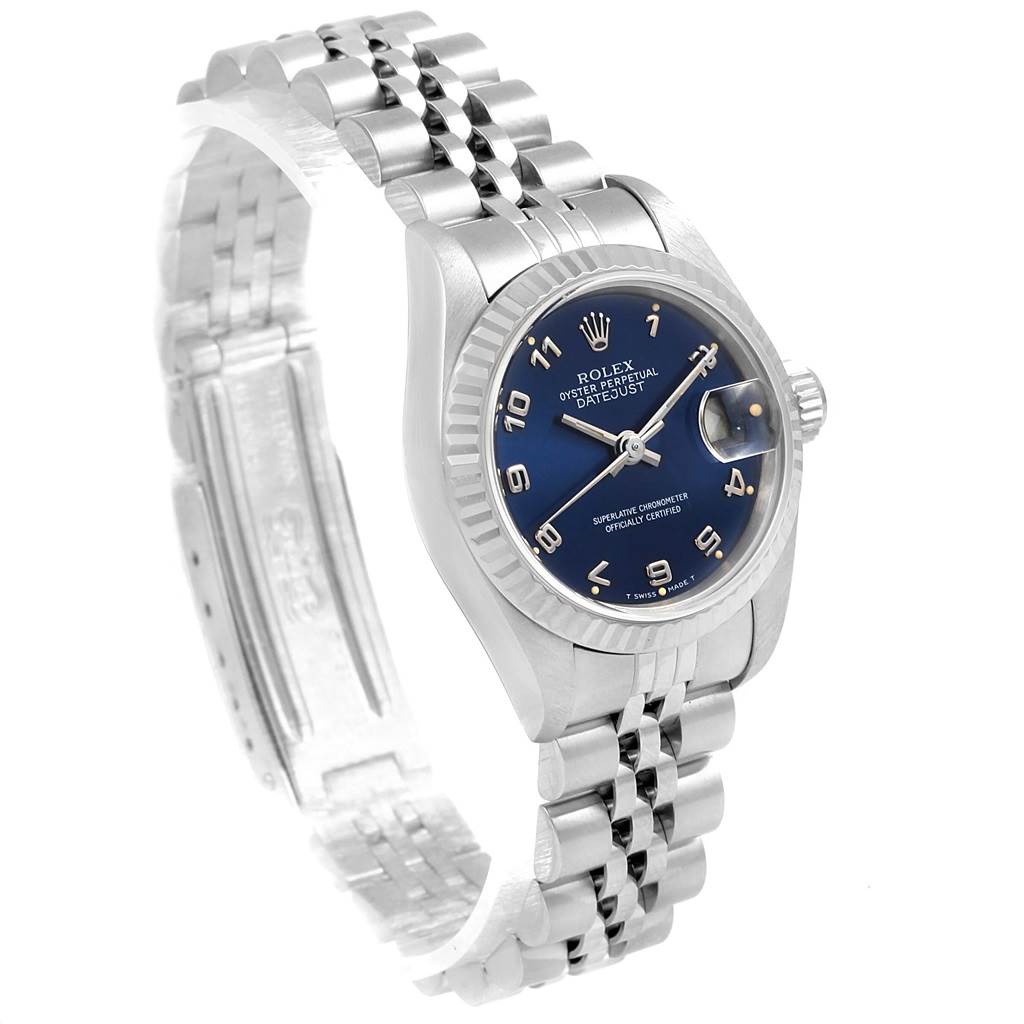 The Rolex Datejust 69174 Women's Stainless Steel Blue Dial 69174 Women's Stainless Steel Blue Dial watch is shown at a three-quarter angle, displaying the face, bezel, and bracelet.