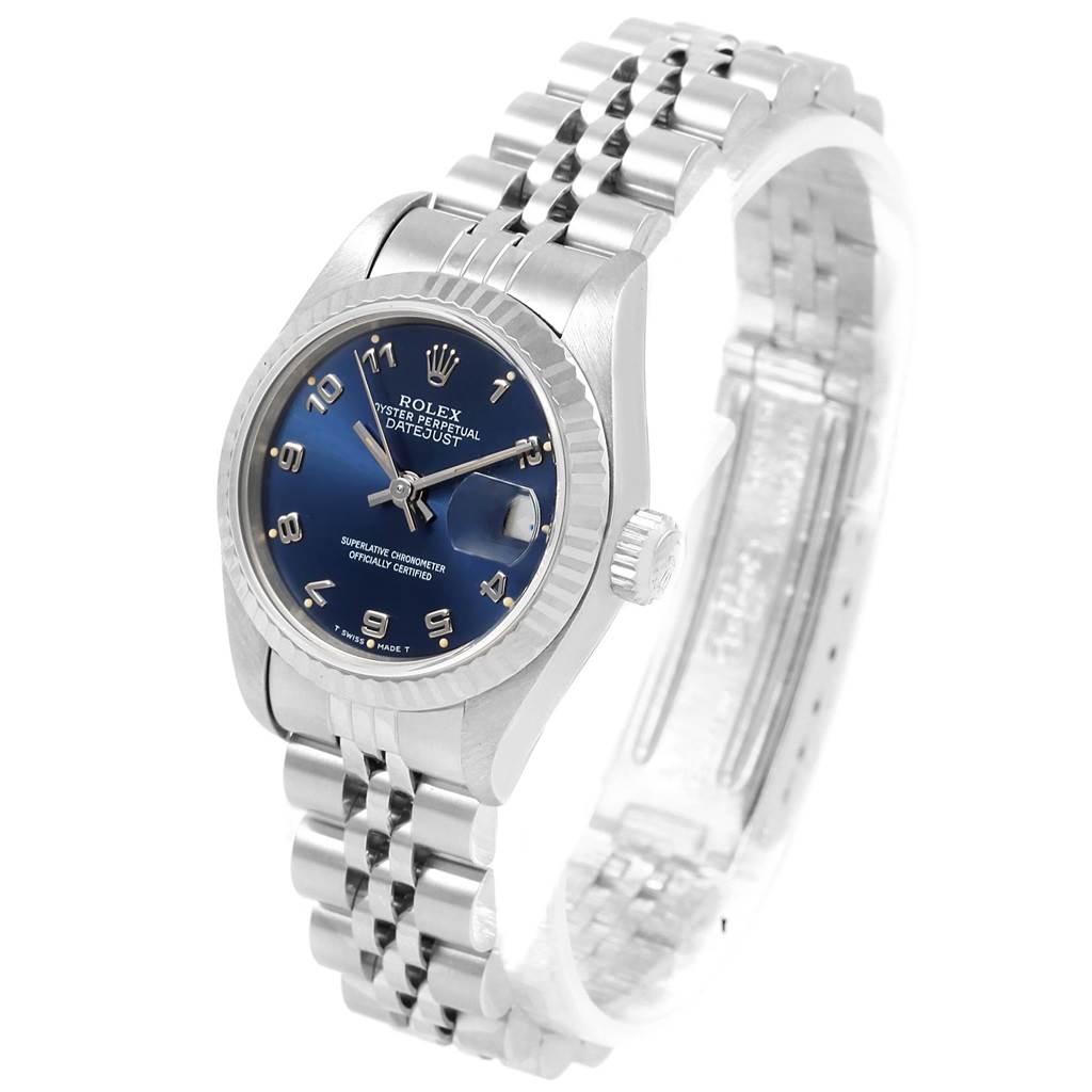 The image shows the Rolex Datejust 69174 Women's Stainless Steel Blue Dial 69174 Women's Stainless Steel Blue Dial watch at a front angle, highlighting its blue dial, fluted bezel, and jubilee bracelet.