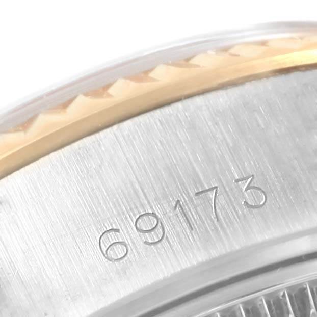 This image shows a close-up of the model number 69173 engraved on the side of a Rolex 69173 Men's Stainless Steel Champagne Dial 69173 Men's Stainless Steel Champagne Dial Datejust Steel Yellow Gold watch.