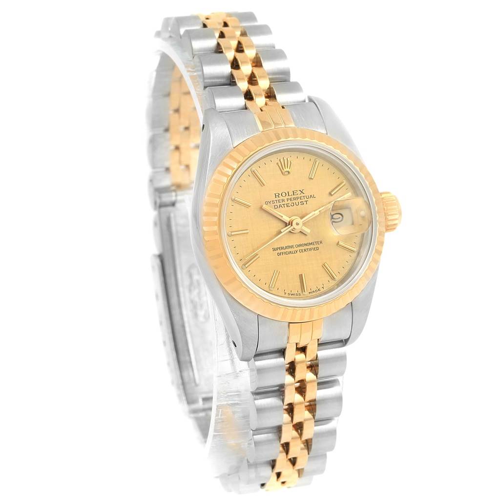 The Rolex 69173 Men's Stainless Steel Champagne Dial 69173 Men's Stainless Steel Champagne Dial Datejust 69173 Steel Yellow Gold Ladies Watch is shown at a three-quarter angle featuring the case, champagne linen dial, and bracelet.