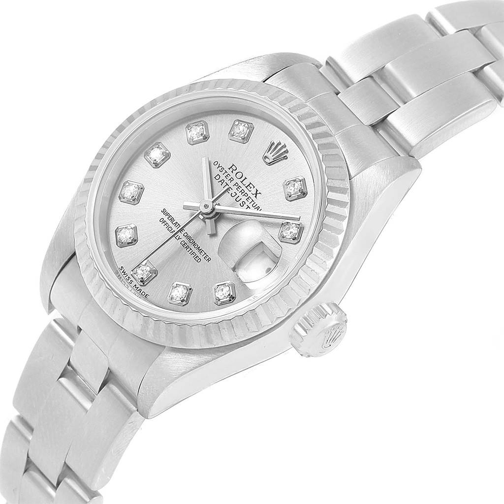 The image shows a close-up, angled view of a Rolex Datejust 79174 Women's Stainless Steel Silver Dial 79174 Women's Stainless Steel Silver Dial watch, highlighting its dial, bezel, and bracelet.