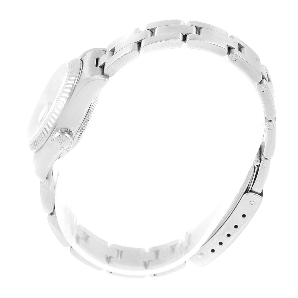 This image shows a side view of the Rolex Datejust 79174 Women's Stainless Steel Silver Dial 79174 Women's Stainless Steel Silver Dial watch, highlighting its bracelet and crown.