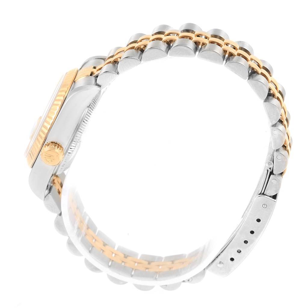 This image shows a side view of a Rolex Datejust 79173 Women's Steel and Gold (two tone) White Dial 79173 Women's Steel and Gold (two tone) White Dial watch, highlighting part of the case and the two-tone bracelet.