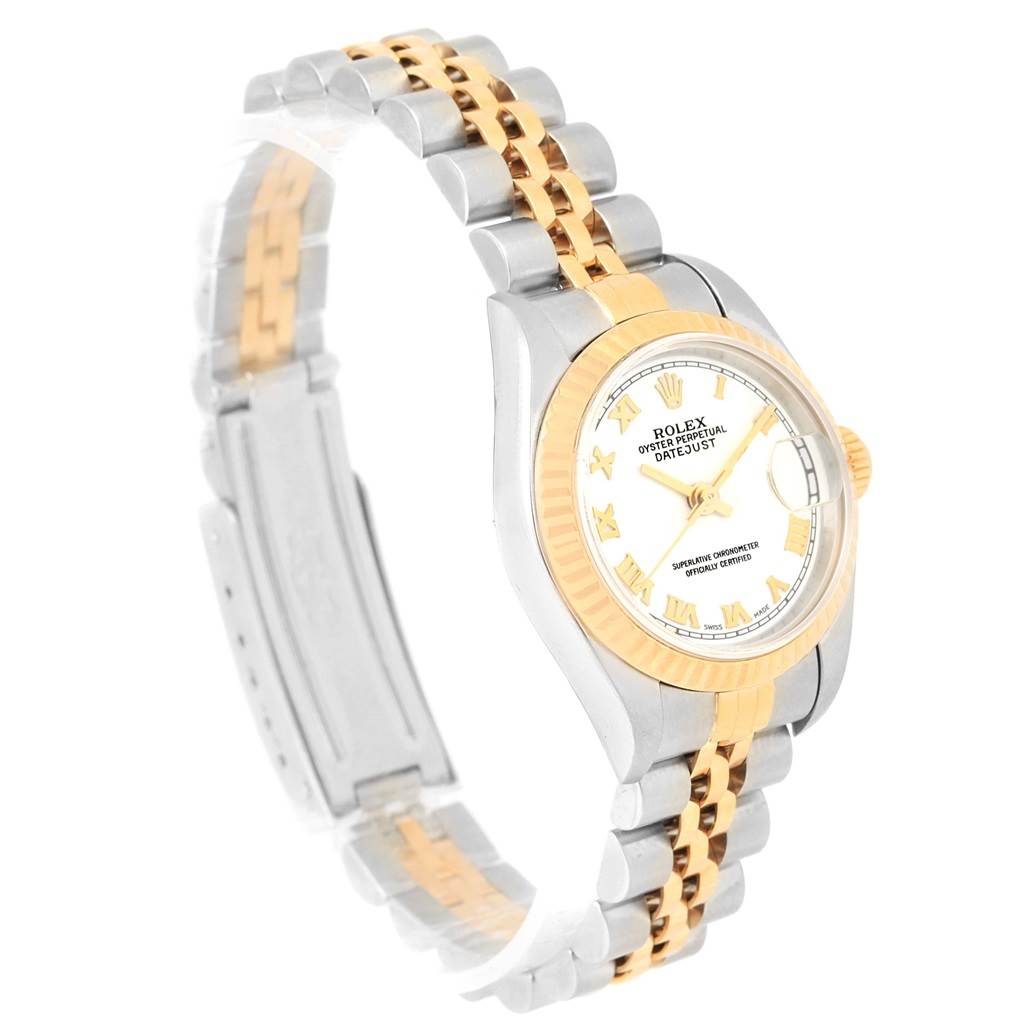 This image shows a Rolex Datejust 79173 Women's Steel and Gold (two tone) White Dial 79173 Women's Steel and Gold (two tone) White Dial watch at a three-quarter angle, highlighting its two-tone bracelet and fluted bezel.