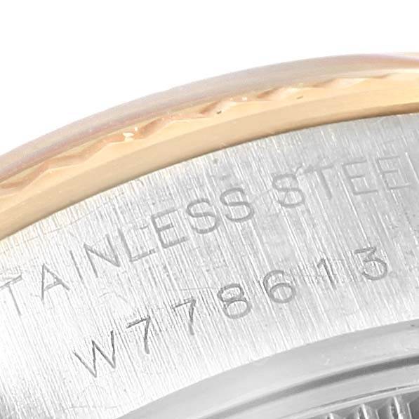 This angle of the Rolex Datejust 69173 Women's Stainless Steel Champagne Dial 69173 Women's Stainless Steel Champagne Dial model shows part of the stainless steel case and bezel markings.